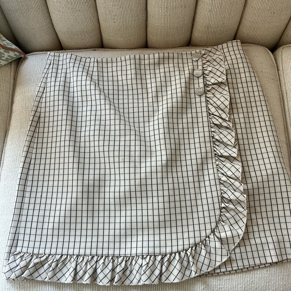 Checkered Ruffle Skirt - Beige with a black and grey plaid this is a skort.
